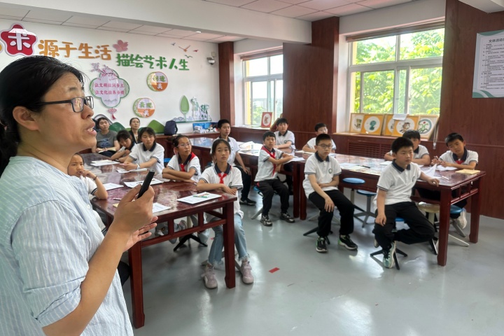 1781232538316.jpg 20260514(刘云飞 尤世娜)地学润童心 科普启新程 校园地质特色科普课程首课开讲 (2).jpg